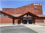 Rust-colored IMAX Theatre at BUFFALO CROSSING RV PARK - thumbnail