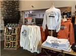 Store selling sweatshirts and mugs at BUFFALO CROSSING RV PARK - thumbnail