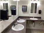 Bathroom sinks and smooth countertops at BUFFALO CROSSING RV PARK - thumbnail