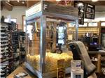 Popcorn machine in campground store at BUFFALO CROSSING RV PARK - thumbnail