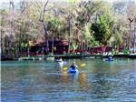 A group of people kayaking at CHASSAHOWITZKA RIVER CAMPGROUND - thumbnail