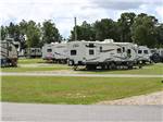 A lot of travel trailers parked in gravel sites at VALDOSTA OAKS RV PARK - thumbnail