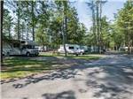 Paved road with RVs on paved pads at OLD ORCHARD BEACH CAMPGROUND - thumbnail