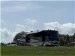 Class A Motorhome parked on-site at GRAND OAKS RESORT - thumbnail