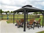 Patio area with outdoor seating at SHADY CREEK RV PARK AND STORAGE - thumbnail
