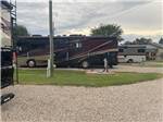 A motorhome in a RV site at GREEN ACRES RV PARK - thumbnail