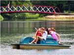 Girls paddle boating on lake at CERALAND PARK & CAMPGROUND - thumbnail