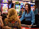 A blackjack dealer at a table at THE RV PARK AT ROLLING HILLS CASINO AND RESORT - thumbnail