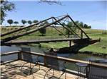 The bridge over the creek at FLAT CREEK FARMS RV RESORT - thumbnail