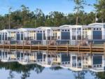 A row of waterfront cottages at SUN OUTDOORS NEW ORLEANS NORTH SHORE - thumbnail