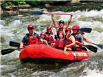 A group of people white water rafting at PIGEON RIVER CAMPGROUND - thumbnail