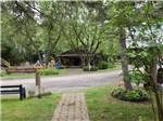A pathway going around the sites at MAPLEWOOD ACRES RV PARK - thumbnail