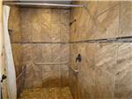 Inside of one of the clean showers at BAR J HITCHIN POST RV - thumbnail