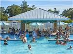 Guest enjoying the swimming pool at SUN OUTDOORS REHOBOTH BAY - thumbnail