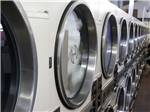 Row of machines in laundry room at YORK KAMPGROUND - thumbnail