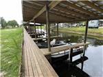 A boat at the covered dock at SPORTSMAN'S COVE RESORT - thumbnail