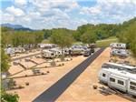 An aerial view of the paved RV sites at RIVEREDGE RV PARK & CABIN RENTALS - thumbnail