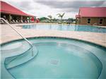 Hot tub and swimming pool at KEYSTONE HEIGHTS RV RESORT - thumbnail