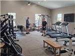 Two men exercising in the exercise room at KEYSTONE HEIGHTS RV RESORT - thumbnail