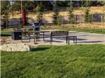 Patio area with picnic table at BERRY CREEK RANCHERIA RV PARK - thumbnail