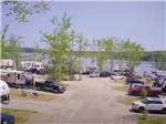 A group of RV sites by the water at CASTLE LAKE CAMPGROUND & COTTAGES - thumbnail