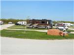 RVs and trailers at campground at WHISTLE STOP RV RESORT - thumbnail
