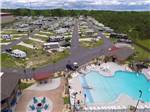 Aerial view of pool and RV sites at NMB RV RESORT AND DRY DOCK MARINA - thumbnail