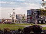 A line of paved RV sites at NORTHERN QUEST RV RESORT - thumbnail