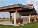The pavilion with picnic benches at NORTHERN QUEST RV RESORT - thumbnail