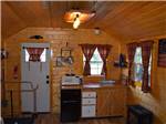 The kitchen area in the rental cabin at GOOSE CREEK RV PARK & CAMPGROUND - thumbnail