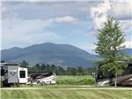 RV and trailer at RIVERSIDE CAMPING & RV RESORT - thumbnail
