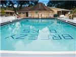 Full length swimming pool at BREEZY OAKS RV PARK - thumbnail