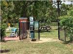The fenced in pet area at ALABAMA COAST CAMPGROUND - thumbnail