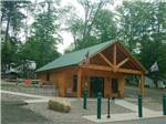 One of the log cabin buildings at GENTILE'S CAMPGROUND - thumbnail