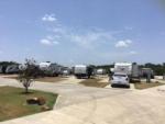 A row of trailers parked in RV sites at EAST FORK RV RESORT - thumbnail