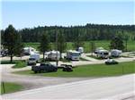 Aerial view of RVs parked in sites at CUSTER CROSSING FAMILY CAMPGROUND - thumbnail
