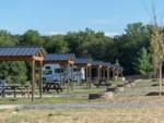 Multiple RV sites with shaded areas and fire pits at LURAY RV RESORT & CAMPGROUND ON SHENANDOAH RIVER - thumbnail