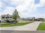 RVs parked at campsites at LIBERTY LAKE RV CAMPGROUND - thumbnail