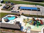 Aerial view over the swimming pool and water slides at SUMMER BREEZE USA KATY - thumbnail