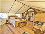 The beds inside of the glamping tent at VERDE RANCH RV RESORT - thumbnail