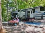 Motorhome and campers enjoying a picnic at GATEWAY TO THE SMOKIES RV PARK & CAMPGROUND - thumbnail