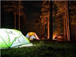 A group of tents at night at IRON MOUNTAIN RESORT - thumbnail
