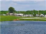 RV sites next to the pond at BIGFOOT ADVENTURE RV PARK & CAMPGROUND - thumbnail