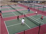 Players compete on pickleball courts at RESORT AT CANOPY OAKS - thumbnail