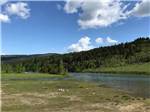 The river that runs next to the campsites at RED EAGLE CAMPGROUND - thumbnail