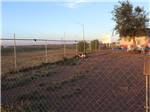 The fenced in dog area at BLAZE-IN-SADDLE RV PARK - thumbnail