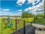 The fenced in pet area at HAWKINS POINTE PARK, STORE & MORE - thumbnail