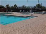 The swimming pool area at CAMPGROUND USA RV RESORT - thumbnail