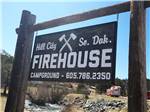 The front entrance sign at FIREHOUSE CAMPGROUND - thumbnail