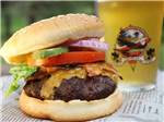 Cheeseburger and a beer at FIREHOUSE CAMPGROUND - thumbnail